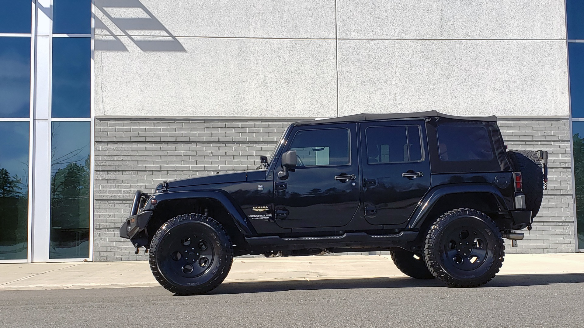 Used 2014 Jeep WRANGLER UNLIMITED SAHARA 4X4 / 3.6L V6 / 5-SPD AUTO / NAV / TOW PKG / SOFT-TOP for sale Sold at Formula Imports in Charlotte NC 28227 2