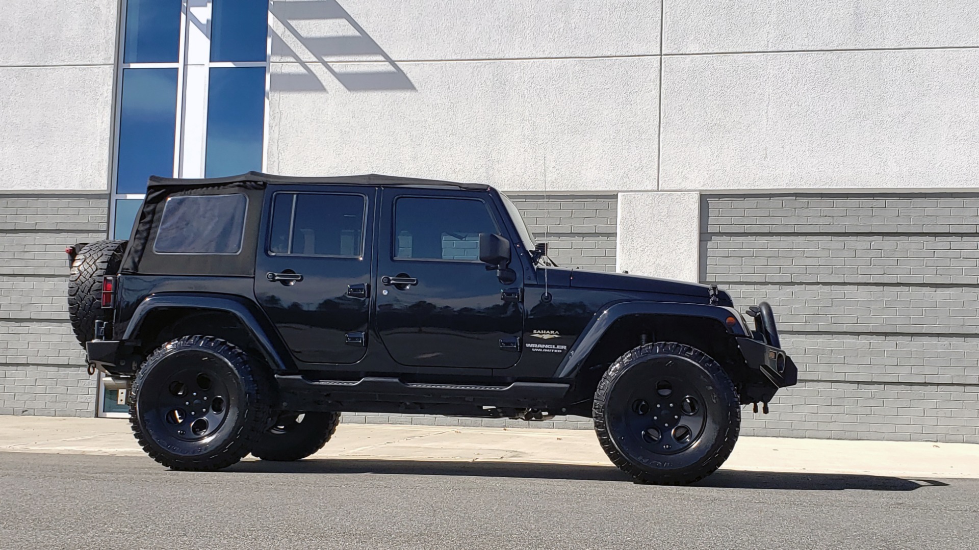 Used 2014 Jeep WRANGLER UNLIMITED SAHARA 4X4 / 3.6L V6 / 5-SPD AUTO / NAV / TOW PKG / SOFT-TOP for sale Sold at Formula Imports in Charlotte NC 28227 5