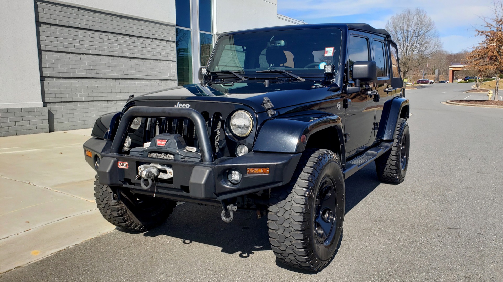 Used 2014 Jeep WRANGLER UNLIMITED SAHARA 4X4 / 3.6L V6 / 5-SPD AUTO / NAV / TOW PKG / SOFT-TOP for sale Sold at Formula Imports in Charlotte NC 28227 1