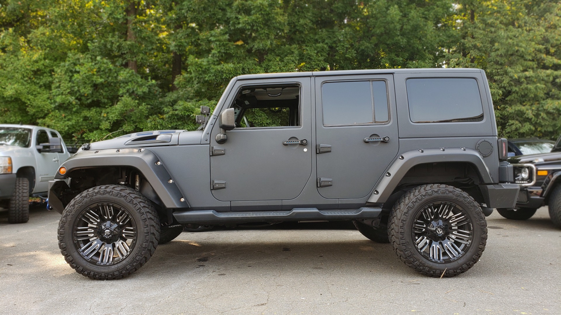 Used 2013 Jeep WRANGLER UNLIMITED FREEDOM EDITION 4X4 / 3.6L / 5-SPD AUTO / ALPINE / CUSTOM for sale Sold at Formula Imports in Charlotte NC 28227 2