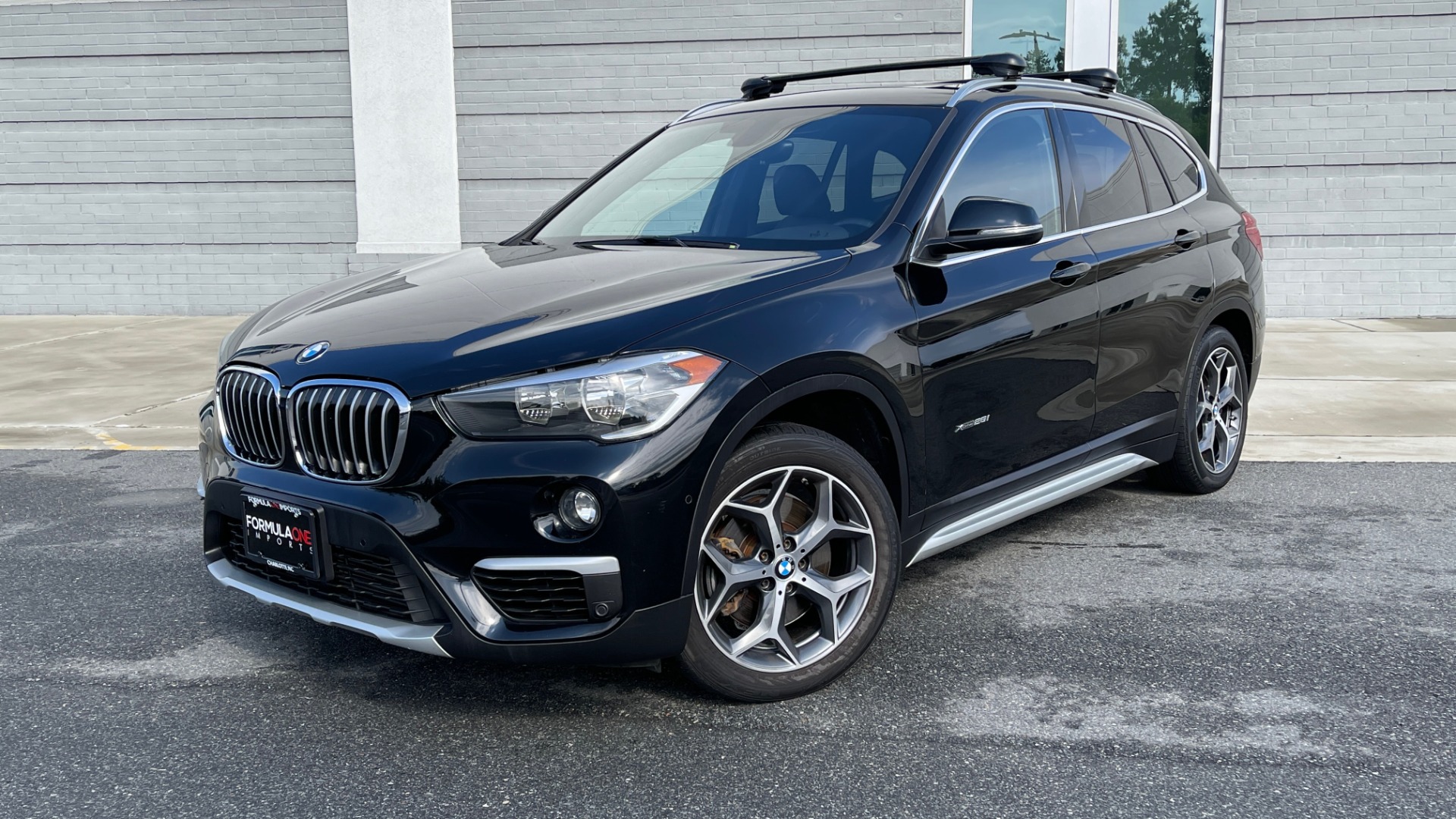 Used 2017 BMW X1 XDRIVE28I / DRVR ASST PKG / COLD WTHR / HTD FRT STS / PANO-ROOF / REARVIEW for sale Sold at Formula Imports in Charlotte NC 28227 1
