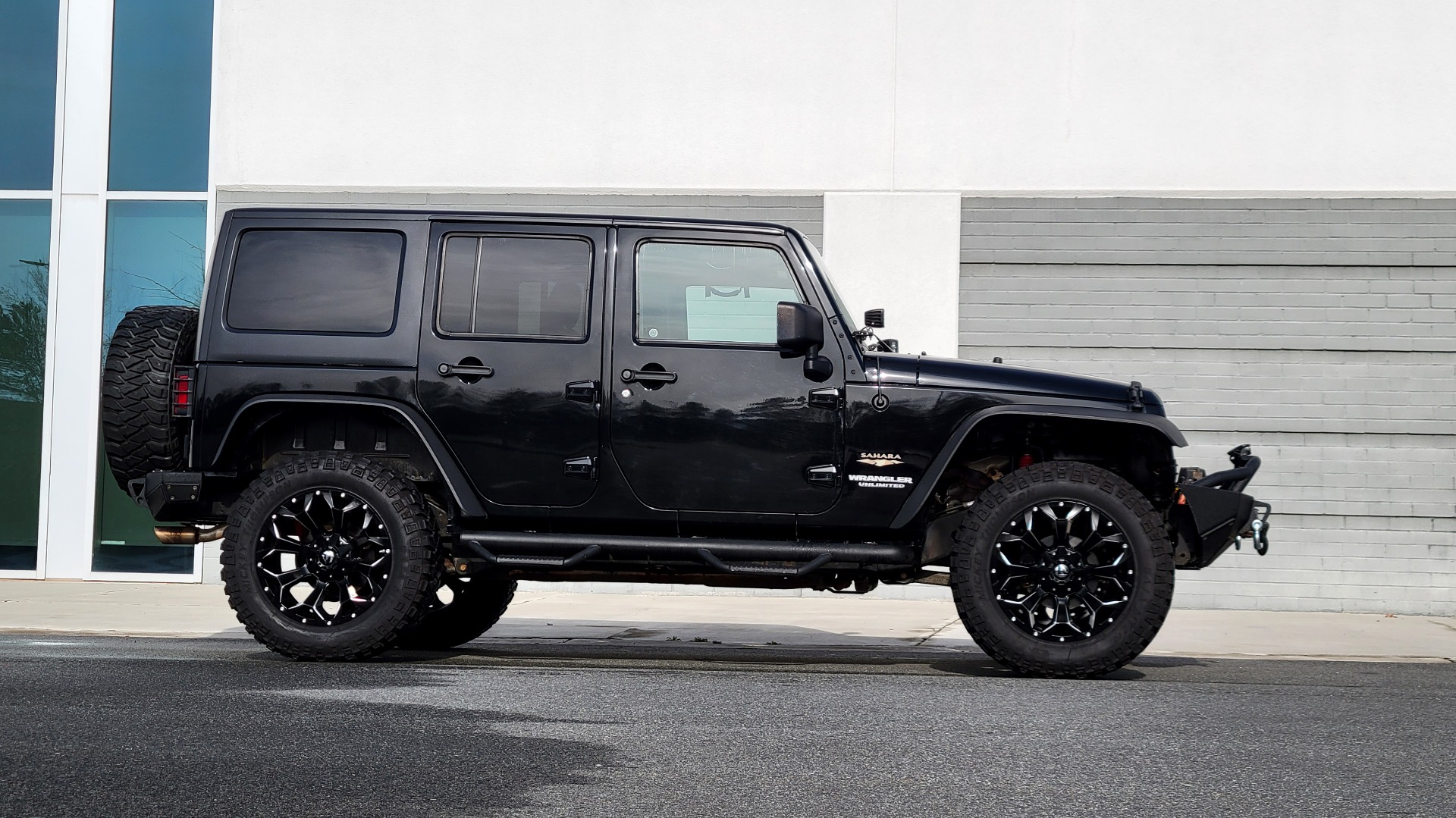 Used 2011 Jeep WRANGLER UNLIMITED SAHARA 4X4 / 3.8L V6 / 4-SPD AUTO / CUSTOM SOUND SYS for sale Sold at Formula Imports in Charlotte NC 28227 11