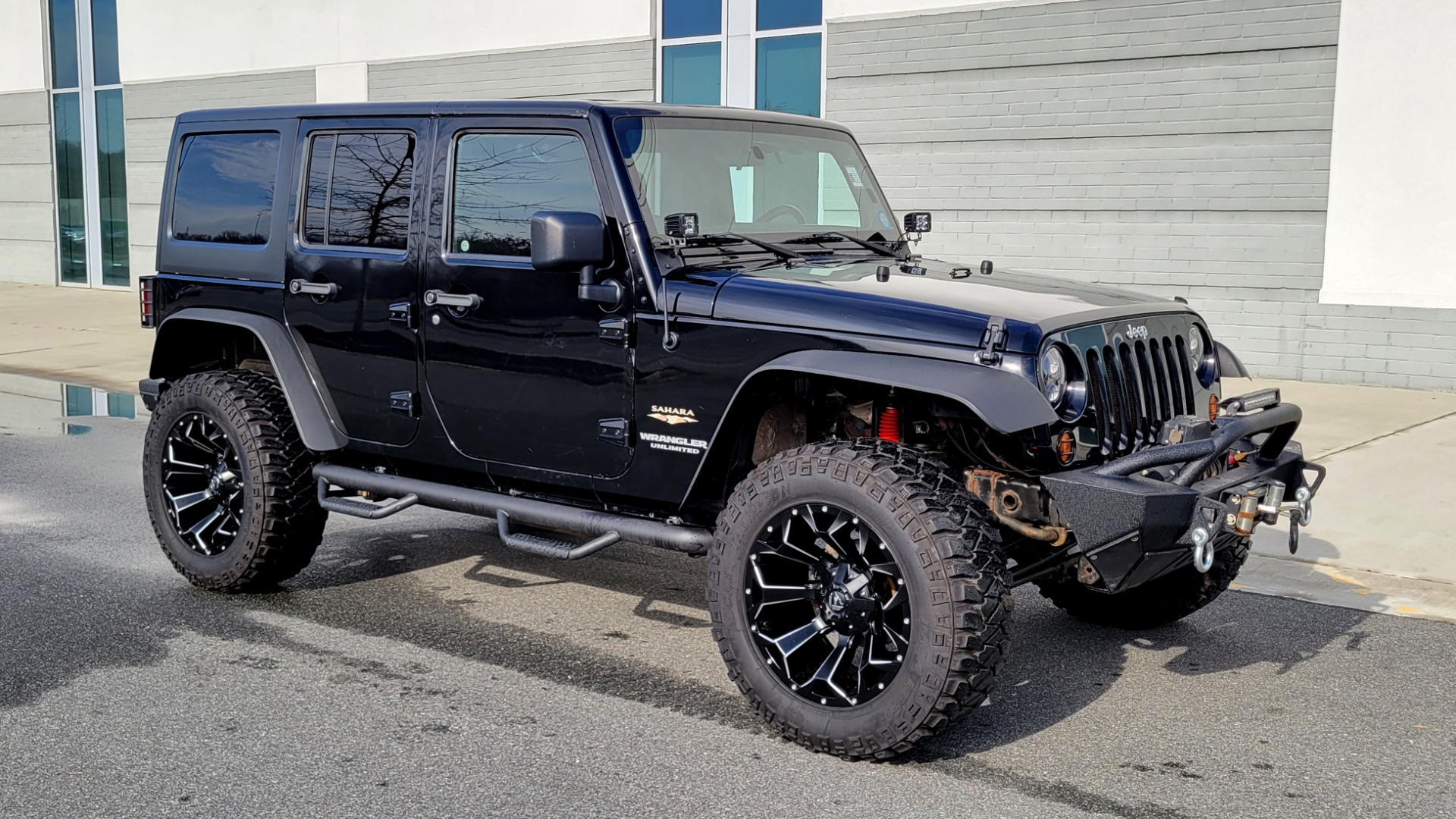 Used 2011 Jeep WRANGLER UNLIMITED SAHARA 4X4 / 3.8L V6 / 4-SPD AUTO / CUSTOM SOUND SYS for sale Sold at Formula Imports in Charlotte NC 28227 12