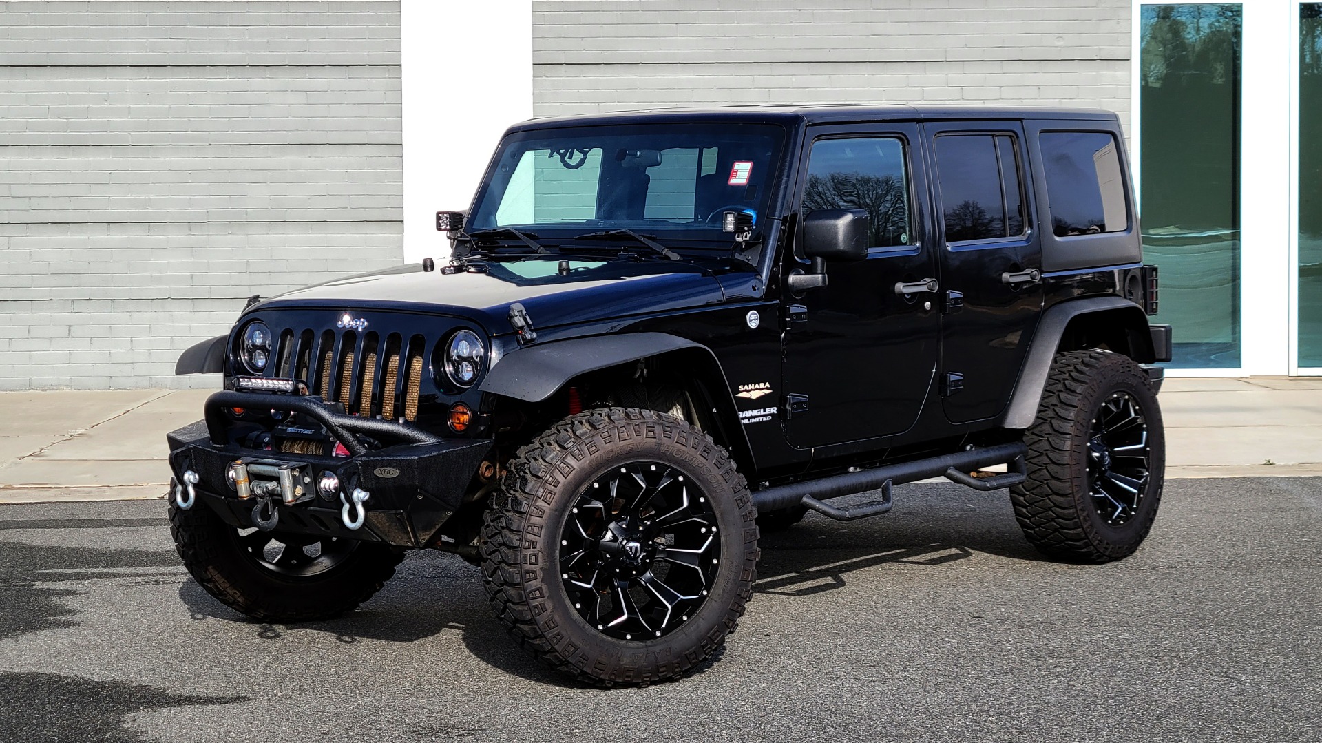 Used 2011 Jeep WRANGLER UNLIMITED SAHARA 4X4 / 3.8L V6 / 4-SPD AUTO / CUSTOM SOUND SYS for sale Sold at Formula Imports in Charlotte NC 28227 2
