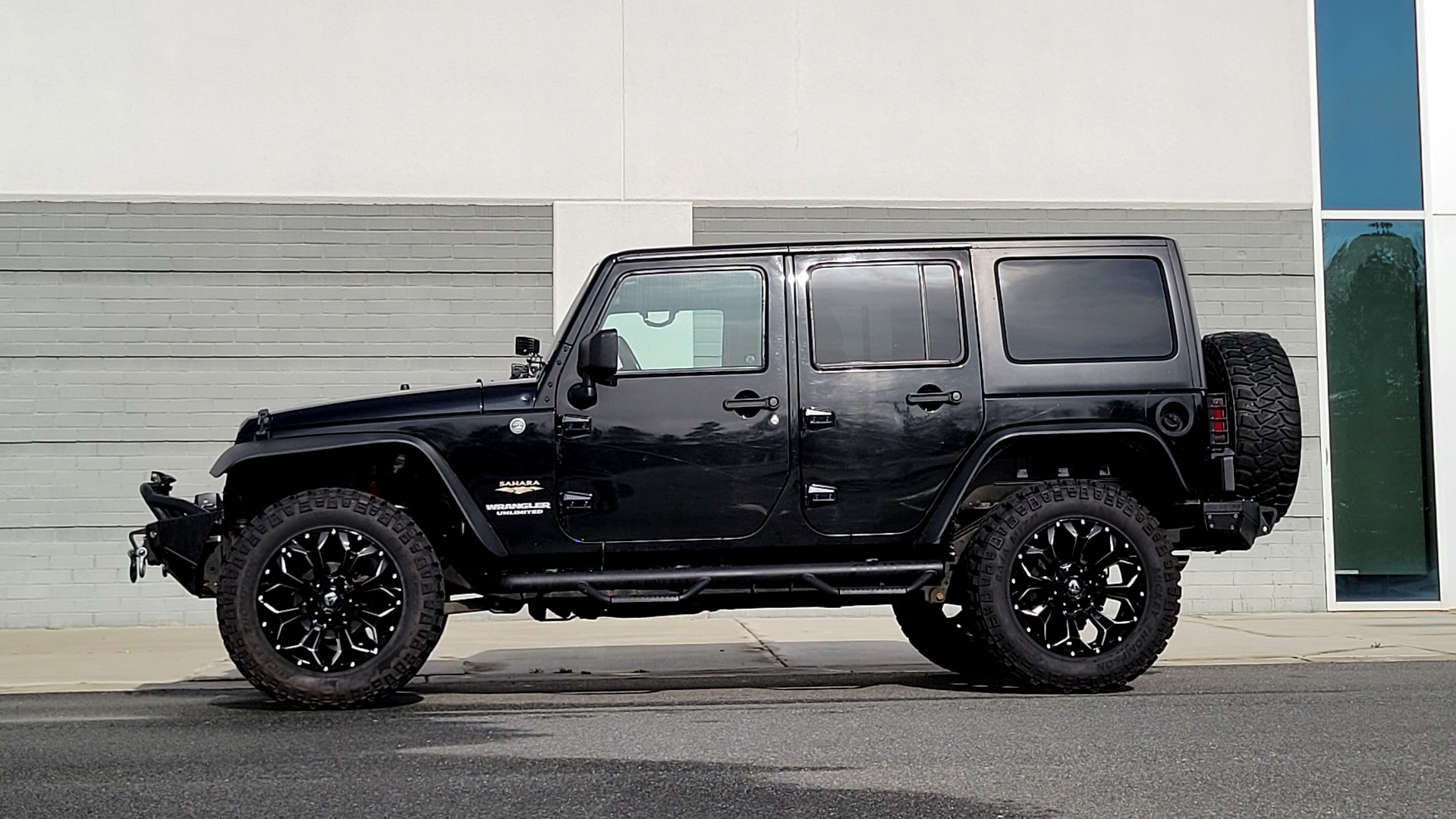 Used 2011 Jeep WRANGLER UNLIMITED SAHARA 4X4 / 3.8L V6 / 4-SPD AUTO / CUSTOM SOUND SYS for sale Sold at Formula Imports in Charlotte NC 28227 4