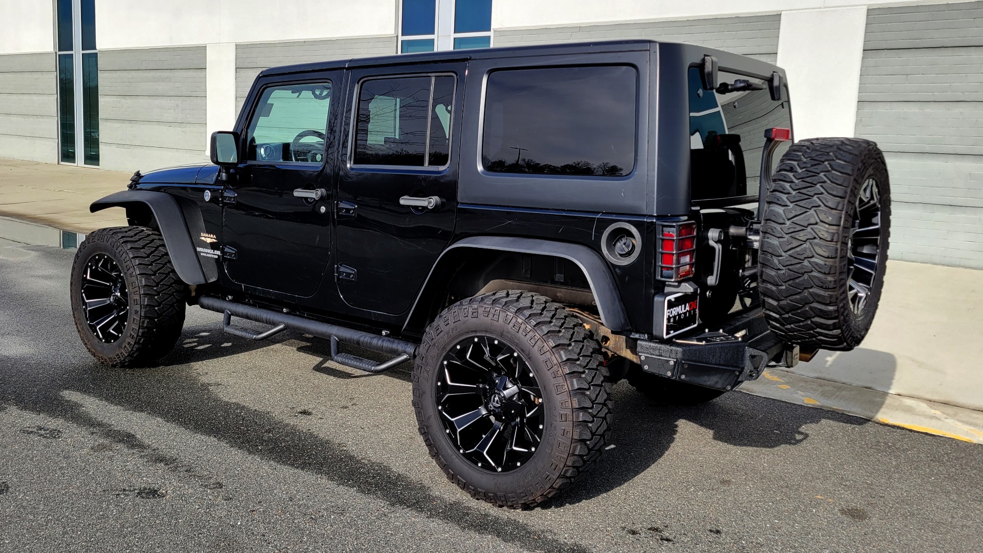 Used 2011 Jeep WRANGLER UNLIMITED SAHARA 4X4 / 3.8L V6 / 4-SPD AUTO / CUSTOM SOUND SYS for sale Sold at Formula Imports in Charlotte NC 28227 5