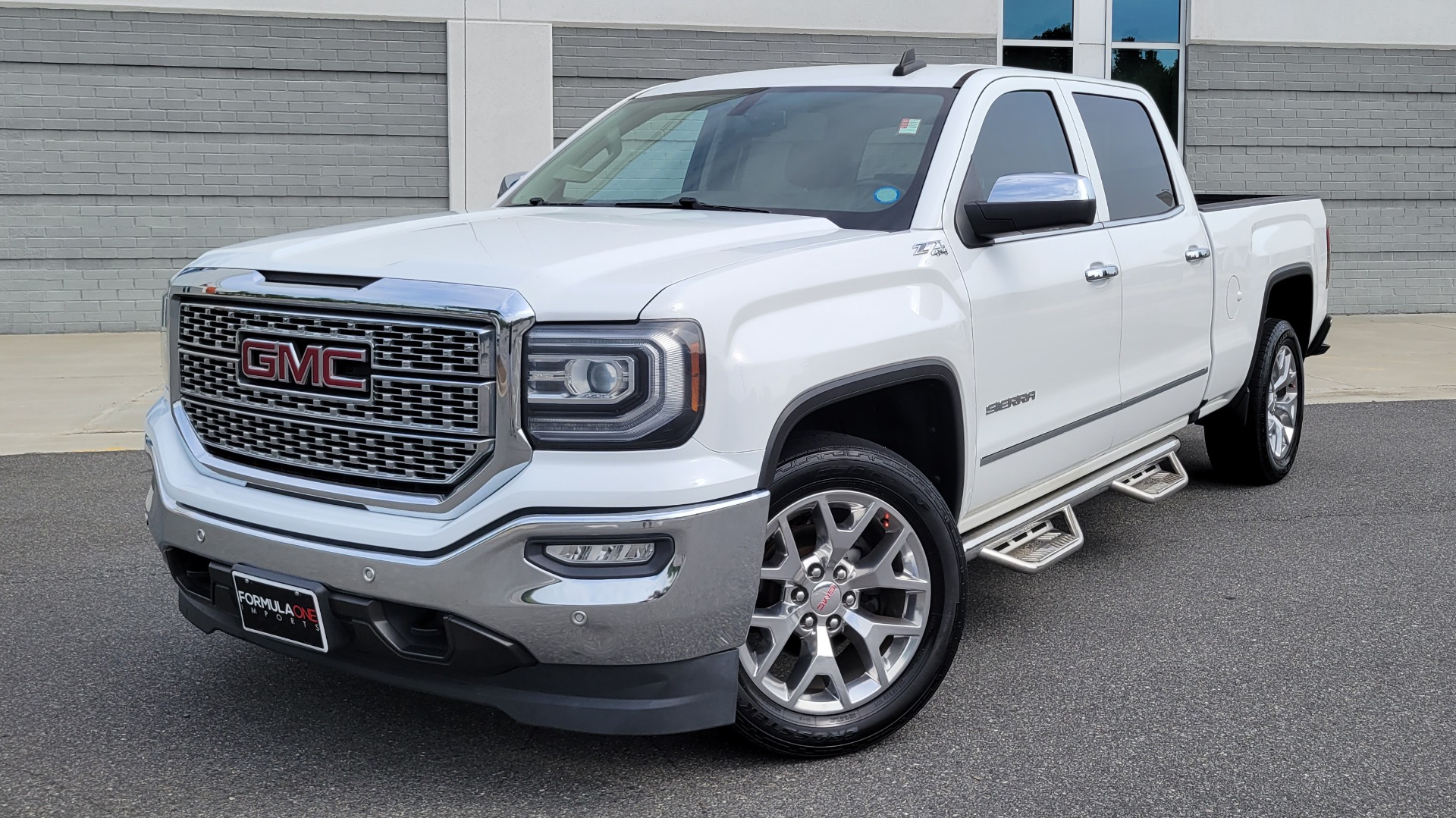 Used 2016 GMC SIERRA 1500 SLT 4X4 Z71 CREWCAB / NAV / BOSE / HTS STS & STRNG WHL / CAMERA for sale $29,695 at Formula Imports in Charlotte NC 28227 1