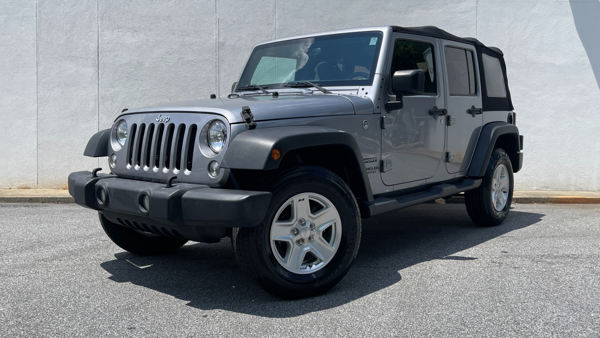 Used 2017 Jeep Wrangler Unlimited Sport S 4X4 / CONNECTIVITY GROUP / SOFT TOP / AUTO for sale $29,995 at Formula Imports in Charlotte NC 28227 1