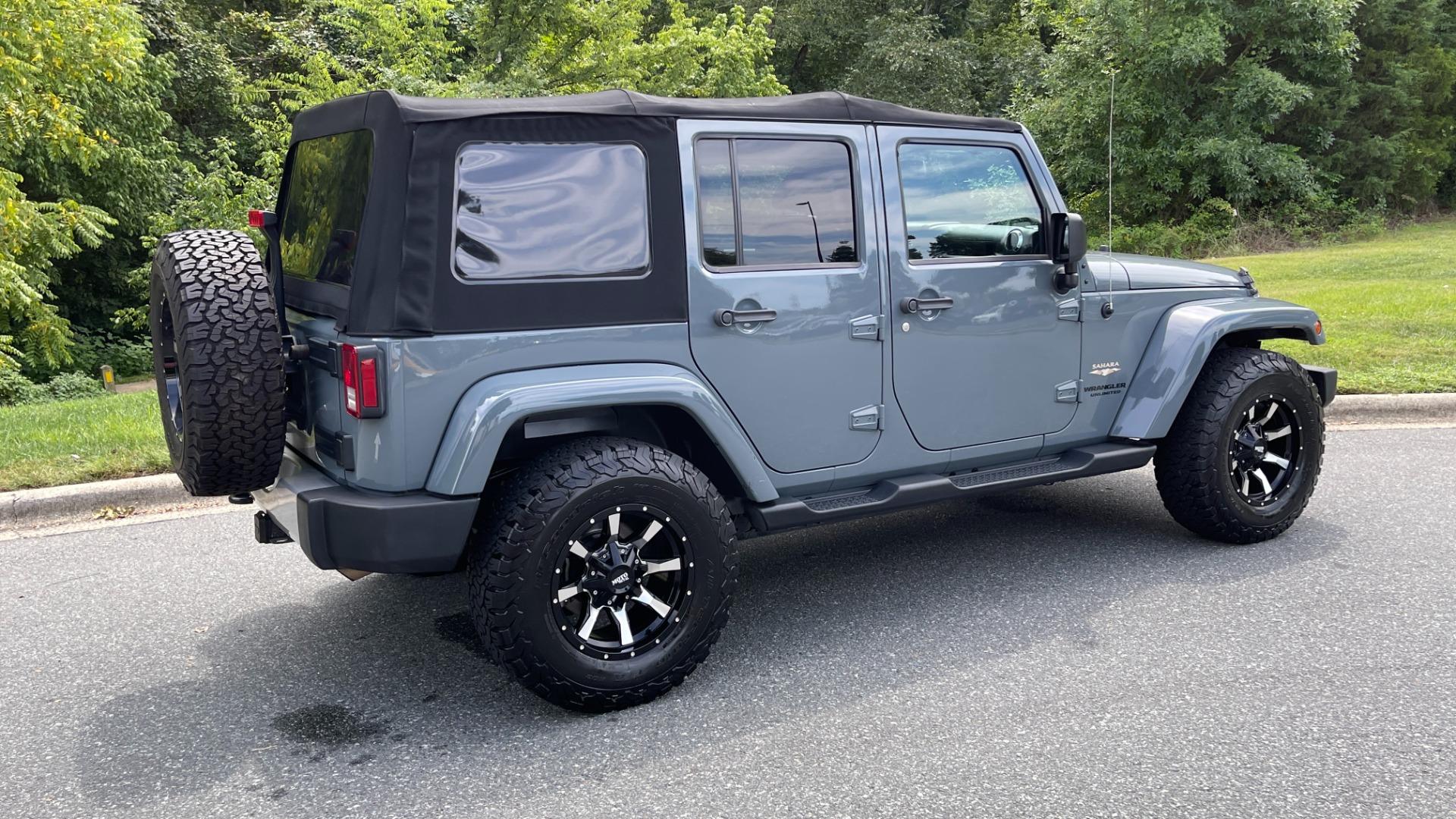 Used 2015 Jeep Wrangler Unlimited SAHARA / UPGRADED WHEELS / SOFT TOP / LED HEADLIGHTS / MAX TOW PACKAGE for sale Sold at Formula Imports in Charlotte NC 28227 4