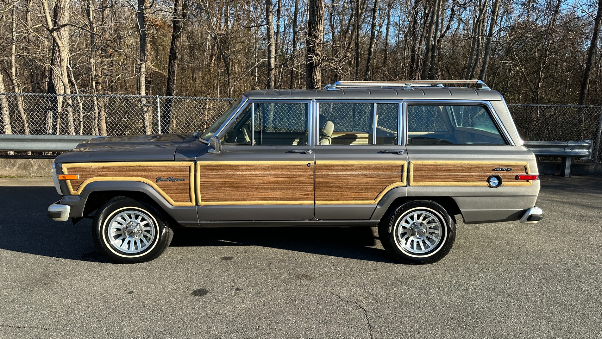 Used 1990 Jeep 5.9L V8 ENGINE / LEATHER AND CLOTH / WOOD SIDING / 4WD for sale $15,995 at Formula Imports in Charlotte NC 28227 3