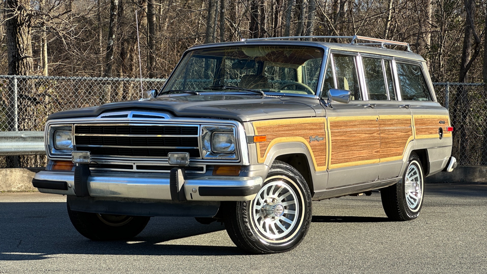Used 1990 Jeep 5.9L V8 ENGINE / LEATHER AND CLOTH / WOOD SIDING / 4WD for sale $15,995 at Formula Imports in Charlotte NC 28227 1