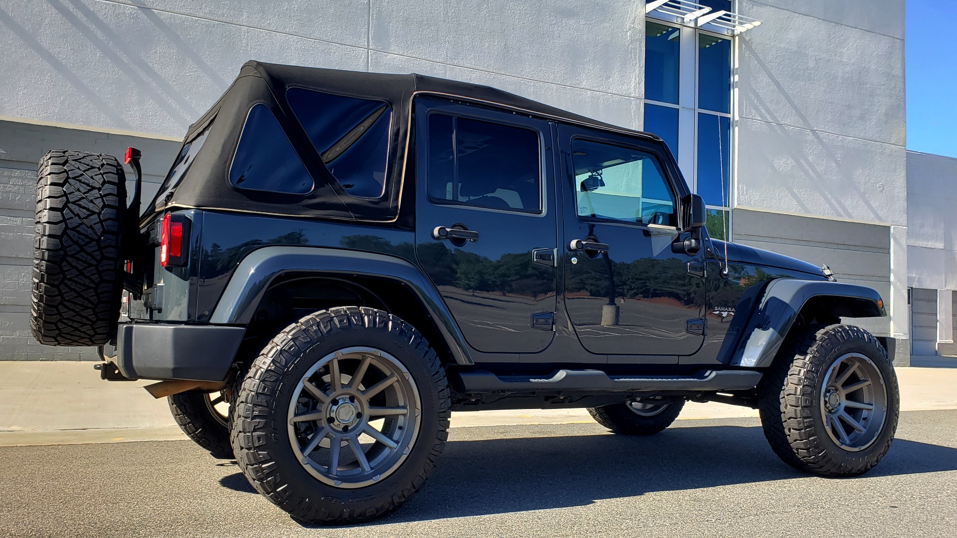 Used 2016 Jeep WRANGLER UNLIMITED SAHARA 4X4 / NAV / ALPINE / TOW PKG / CUSTOM WHEELS for sale Sold at Formula Imports in Charlotte NC 28227 7