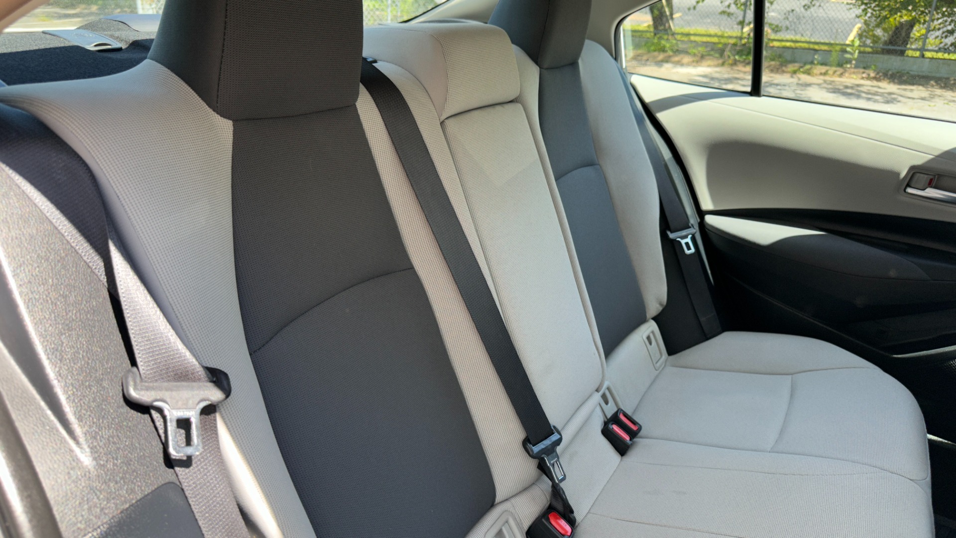 Used 2021 Toyota Corolla LE / CLOTH / STEEL WHEELS / ENTERTAINMENT DISPLAY / 4CYL for sale $21,595 at Formula Imports in Charlotte NC 28227 27
