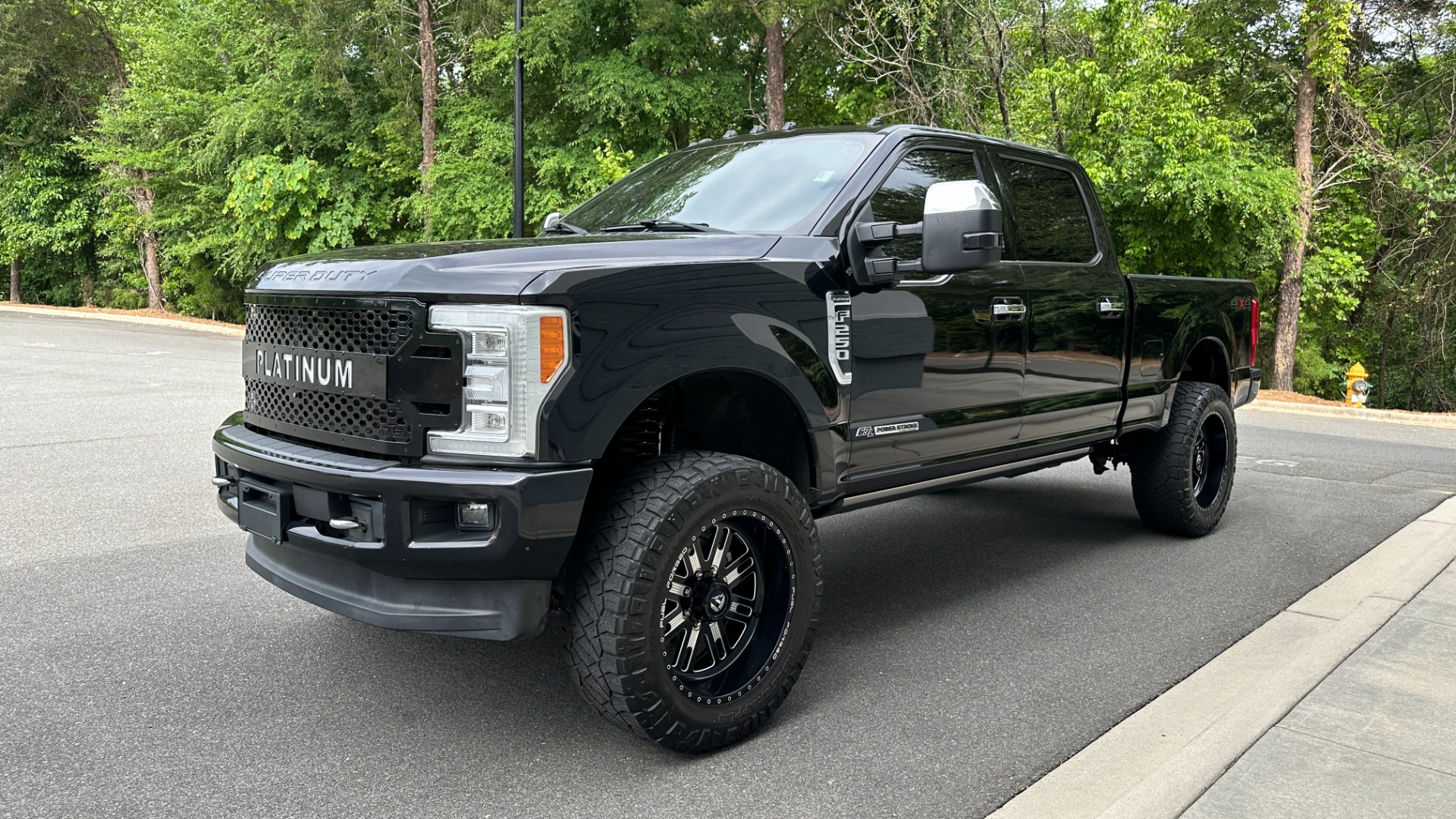 Used 2017 Ford Super Duty F-250 SRW PLATINUM / FABTECH LIFT / FUEL WHEELS / PANORAMIC ROOF / ROCK LIGHTS for sale Sold at Formula Imports in Charlotte NC 28227 2