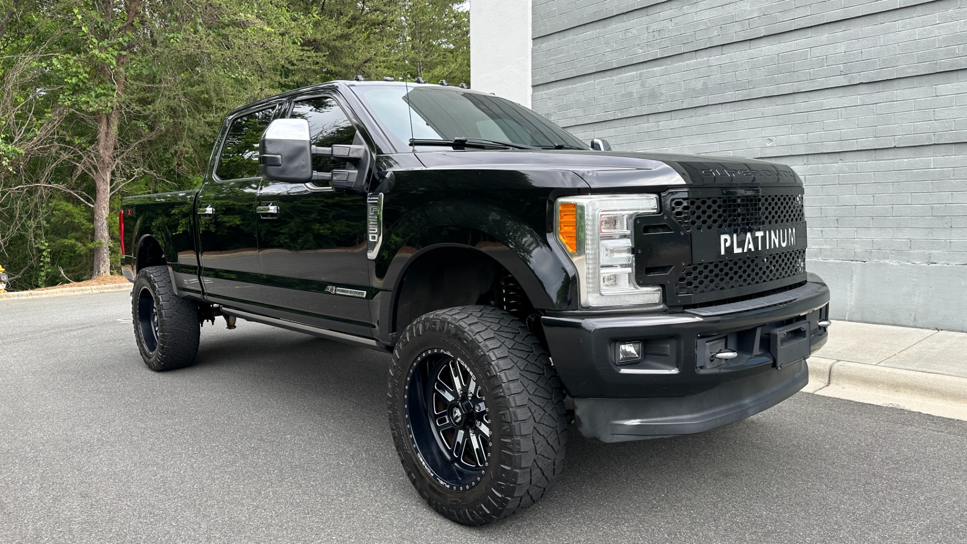 Used 2017 Ford Super Duty F-250 SRW PLATINUM / FABTECH LIFT / FUEL WHEELS / PANORAMIC ROOF / ROCK LIGHTS for sale Sold at Formula Imports in Charlotte NC 28227 4