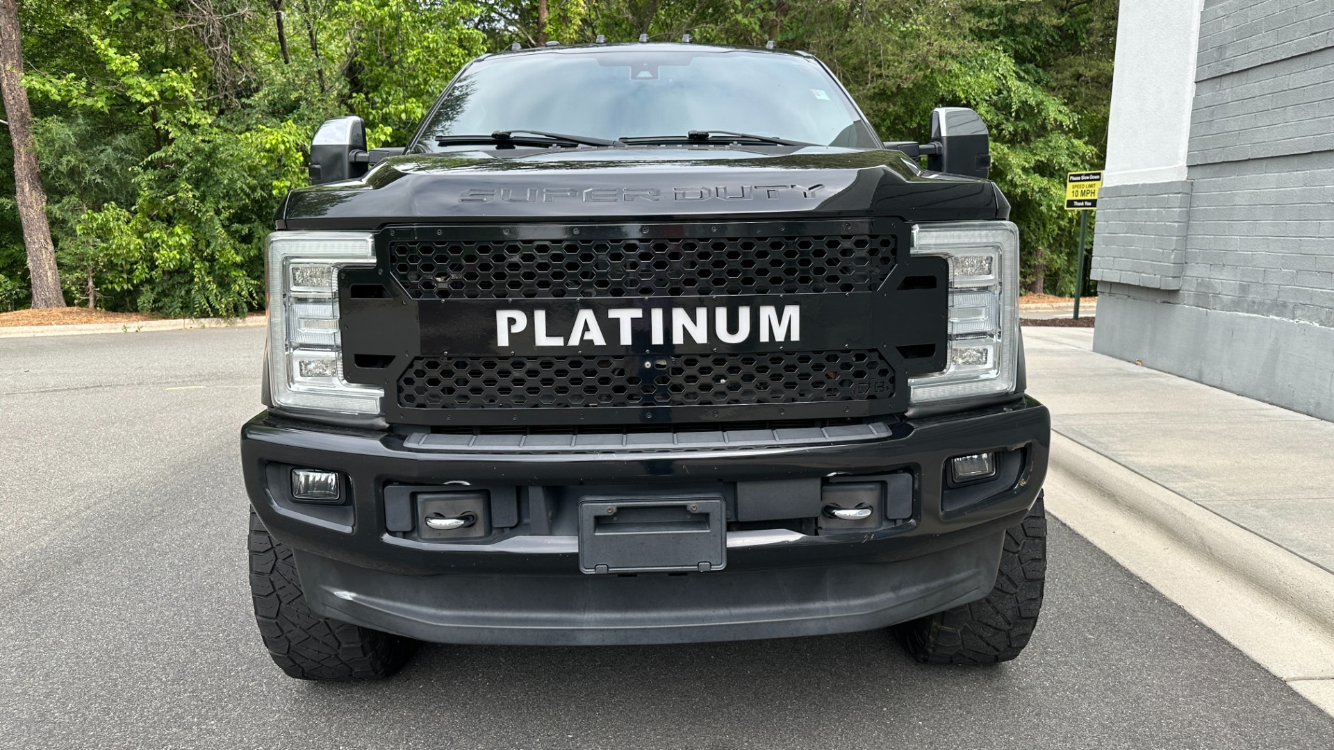 Used 2017 Ford Super Duty F-250 SRW PLATINUM / FABTECH LIFT / FUEL WHEELS / PANORAMIC ROOF / ROCK LIGHTS for sale Sold at Formula Imports in Charlotte NC 28227 8