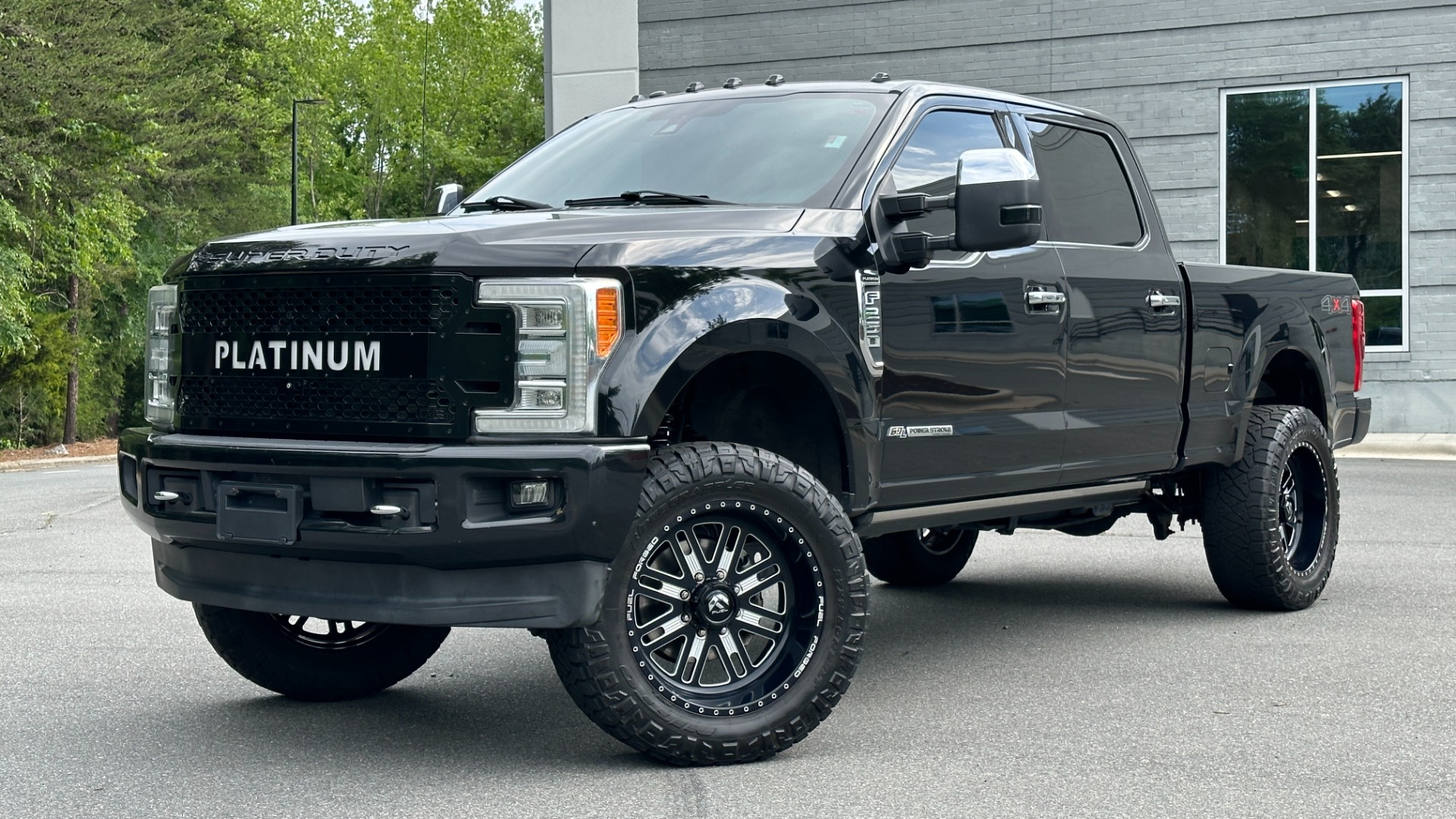 Used 2017 Ford Super Duty F-250 SRW PLATINUM / FABTECH LIFT / FUEL WHEELS / PANORAMIC ROOF / ROCK LIGHTS for sale Sold at Formula Imports in Charlotte NC 28227 1