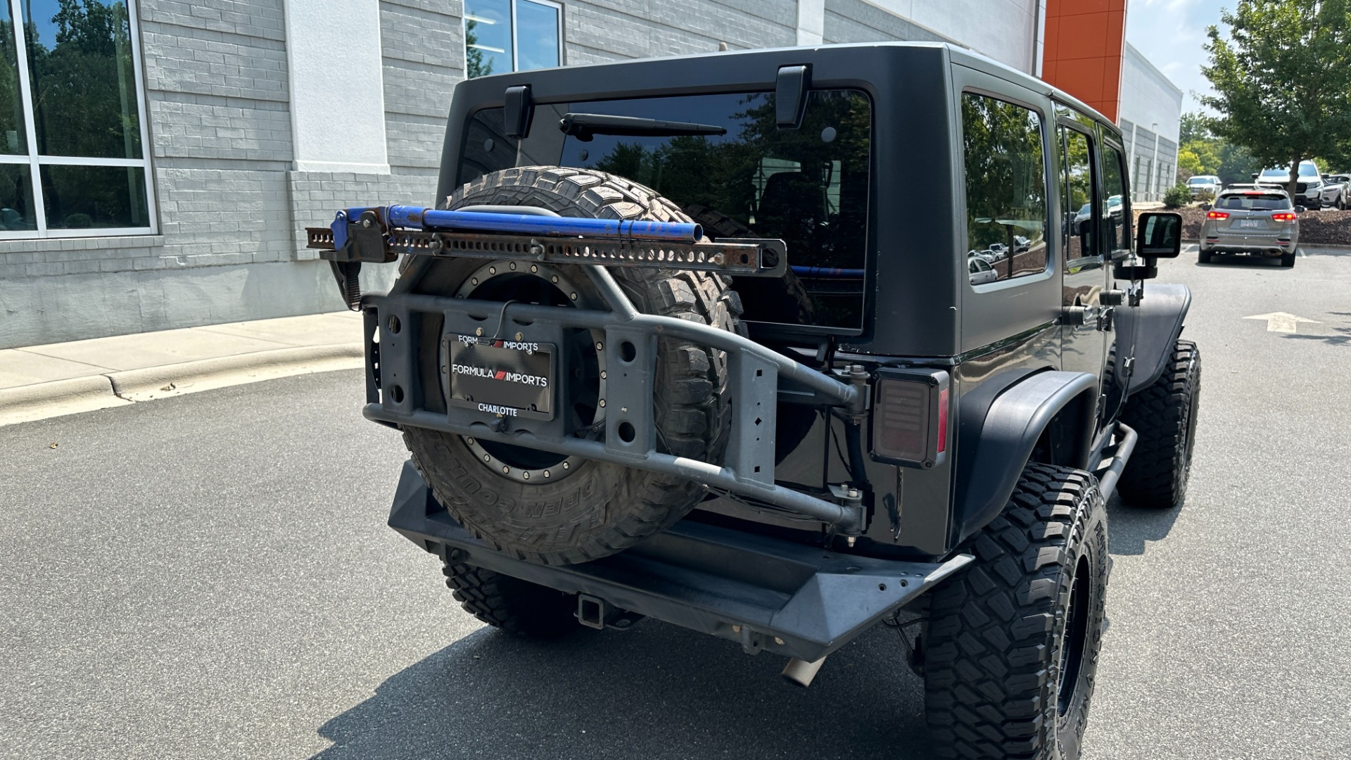 Used 2013 Jeep Wrangler Unlimited Sport / FOX SHOCKS / SOUND SYSTEM / TOUCHSCREEN / SUBWOOFER / TERRAFLEX SUS for sale $24,999 at Formula Imports in Charlotte NC 28227 5