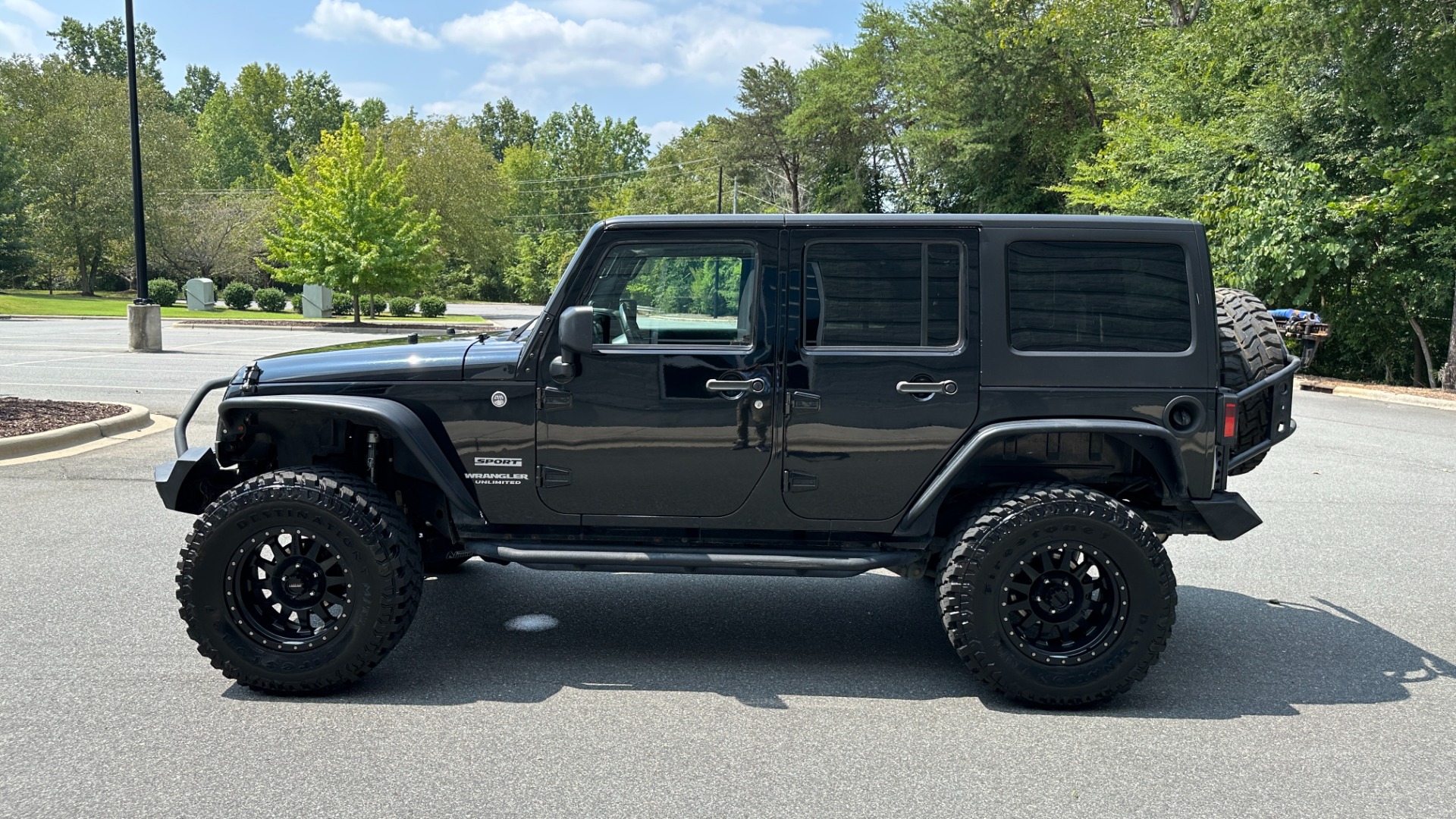 Used 2013 Jeep Wrangler Unlimited Sport / FOX SHOCKS / SOUND SYSTEM / TOUCHSCREEN / SUBWOOFER / TERRAFLEX SUS for sale $24,999 at Formula Imports in Charlotte NC 28227 9