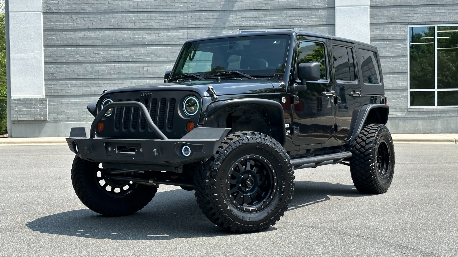 Used 2013 Jeep Wrangler Unlimited Sport / FOX SHOCKS / SOUND SYSTEM / TOUCHSCREEN / SUBWOOFER / TERRAFLEX SUS for sale $24,999 at Formula Imports in Charlotte NC 28227 1