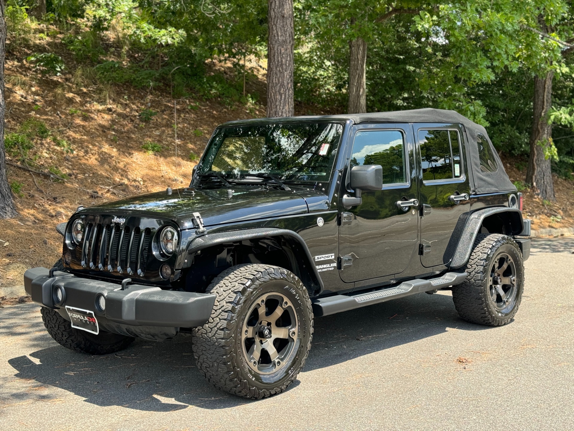Used 2016 Jeep Wrangler Unlimited Sport POWER MYTOP / FUEL WHEELS / OFFROAD TIRES for sale Sold at Formula Imports in Charlotte NC 28227 4