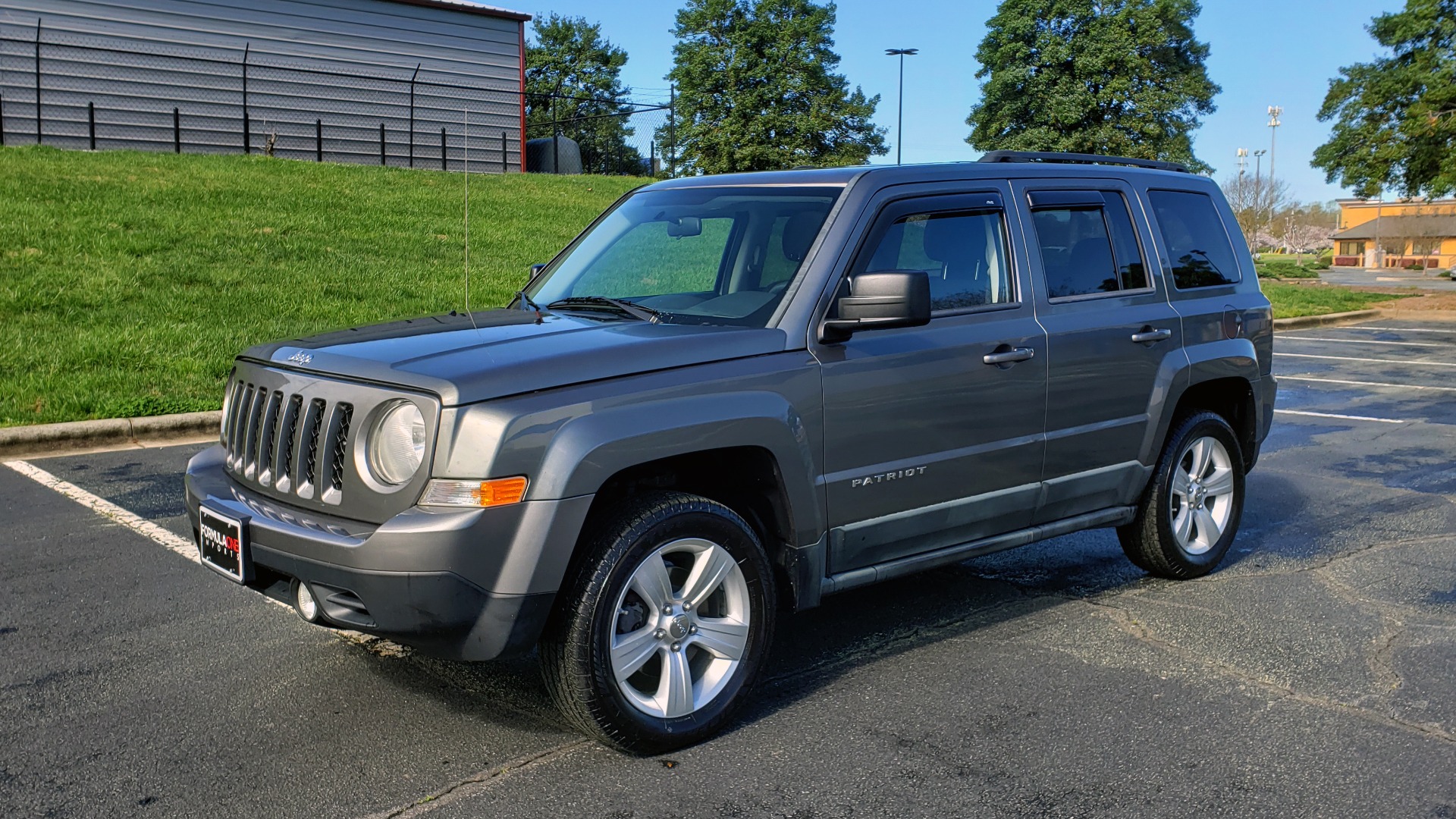 Used 2012 Jeep PATRIOT LATITUDE 4WD / SUNROOF / BOSTON ACOUSTICS SOUND for sale Sold at Formula Imports in Charlotte NC 28227 1