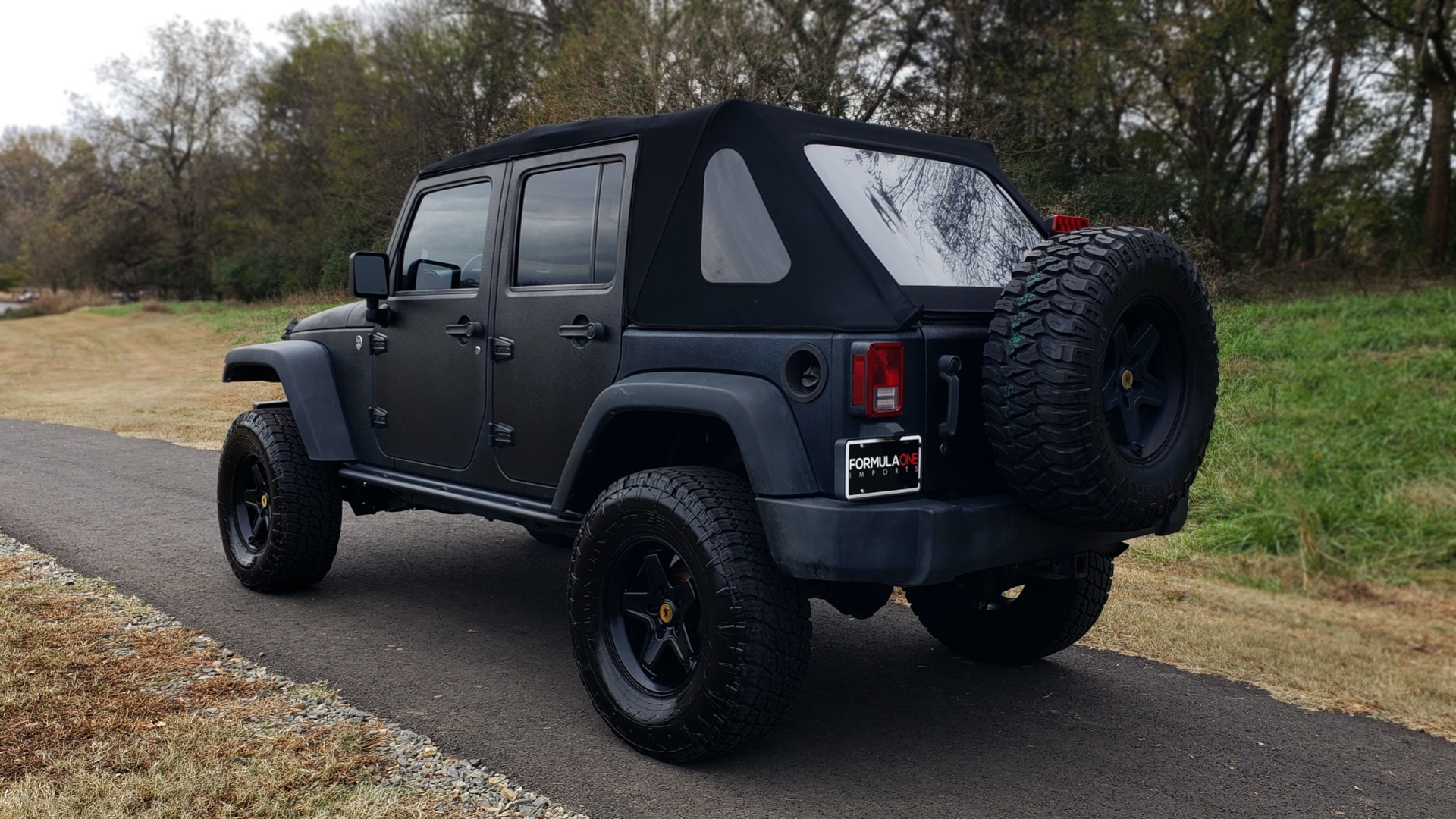 Used 2011 Jeep WRANGLER UNLIMITED / V6 / AUTO / SPORT 4X4 for sale Sold at Formula Imports in Charlotte NC 28227 3