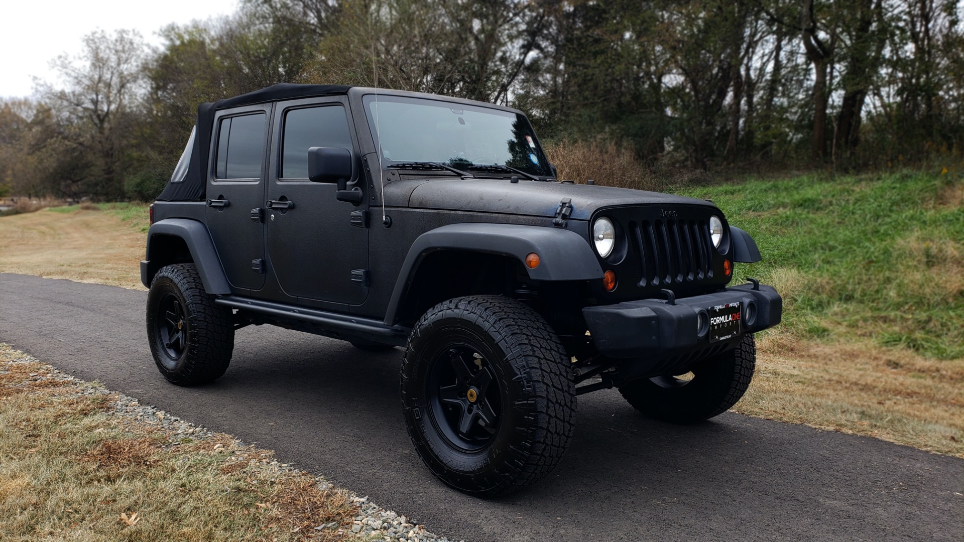Used 2011 Jeep WRANGLER UNLIMITED / V6 / AUTO / SPORT 4X4 for sale Sold at Formula Imports in Charlotte NC 28227 4