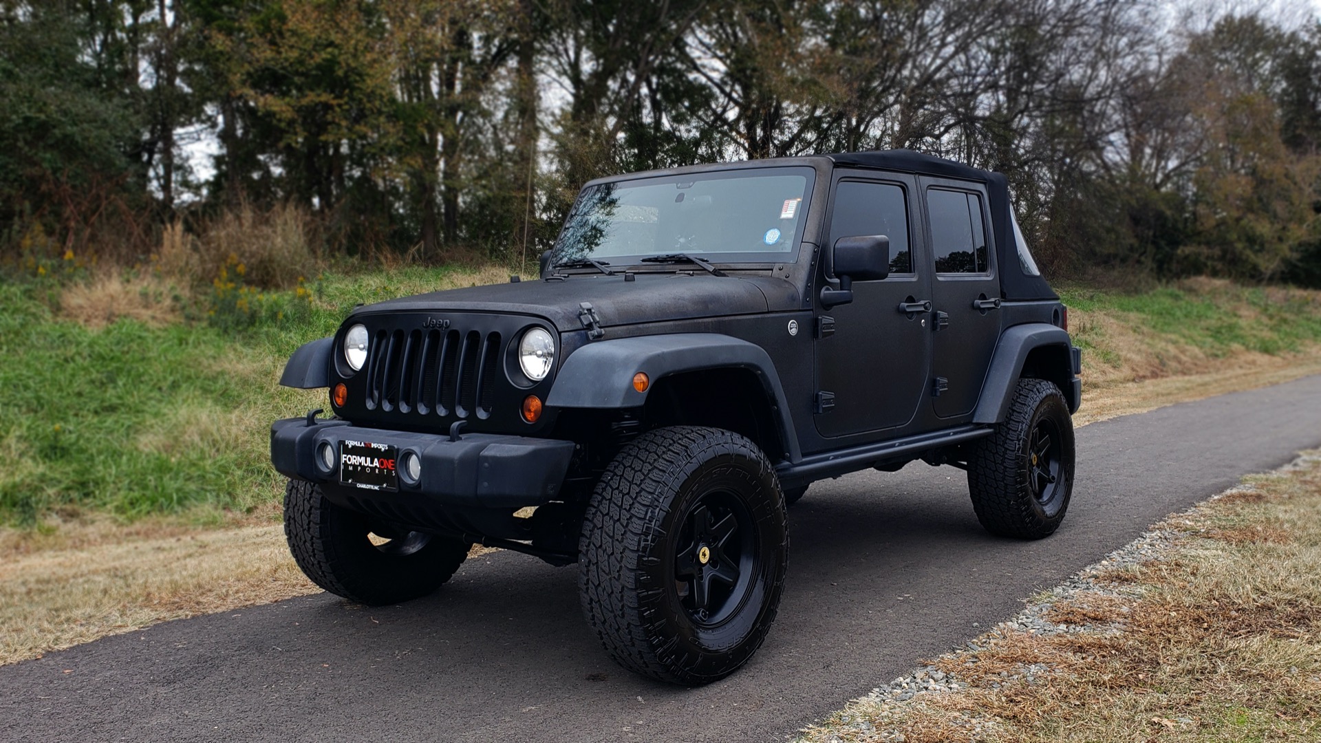 Used 2011 Jeep WRANGLER UNLIMITED / V6 / AUTO / SPORT 4X4 for sale Sold at Formula Imports in Charlotte NC 28227 1