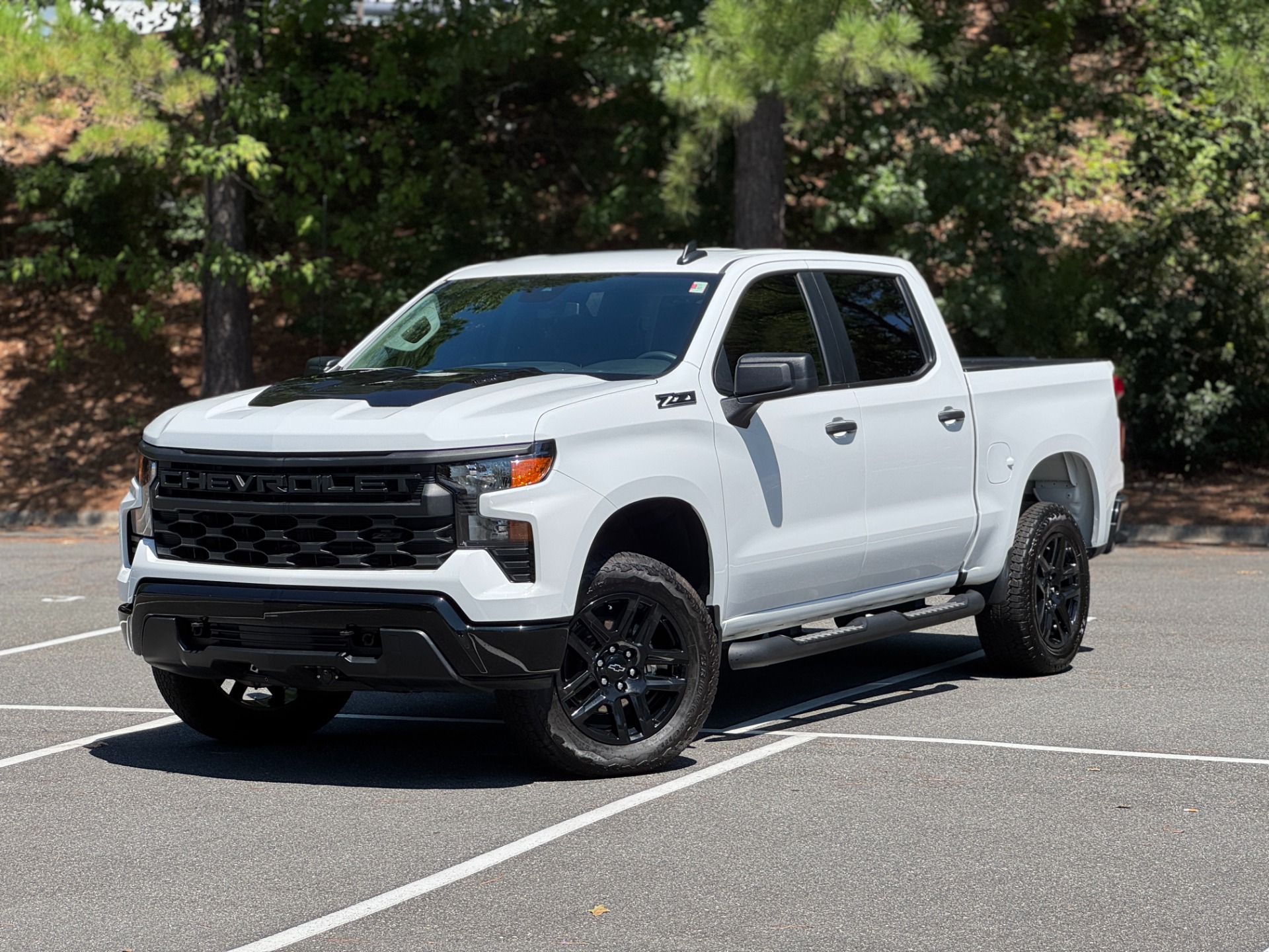 Used 2025 Chevrolet Silverado 1500 4WD Crew Cab 147 Custom Trail Boss TURBOMAX BLACKOUT PACKAGE / 2OIN WHEELS for sale $42,995 at Formula Imports in Charlotte NC 28227 1