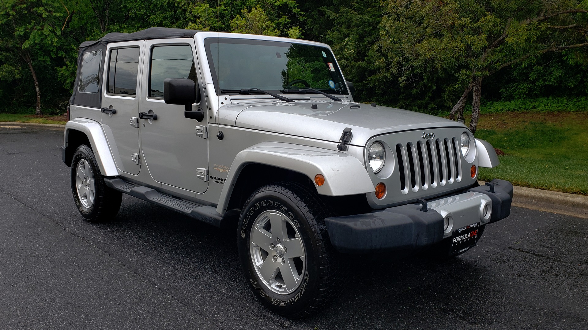 Used 2011 Jeep WRANGLER UNLIMITED SAHARA 4WD / 3-PC FREEDOM TOP / 6-SPD MANUAL for sale Sold at Formula Imports in Charlotte NC 28227 4