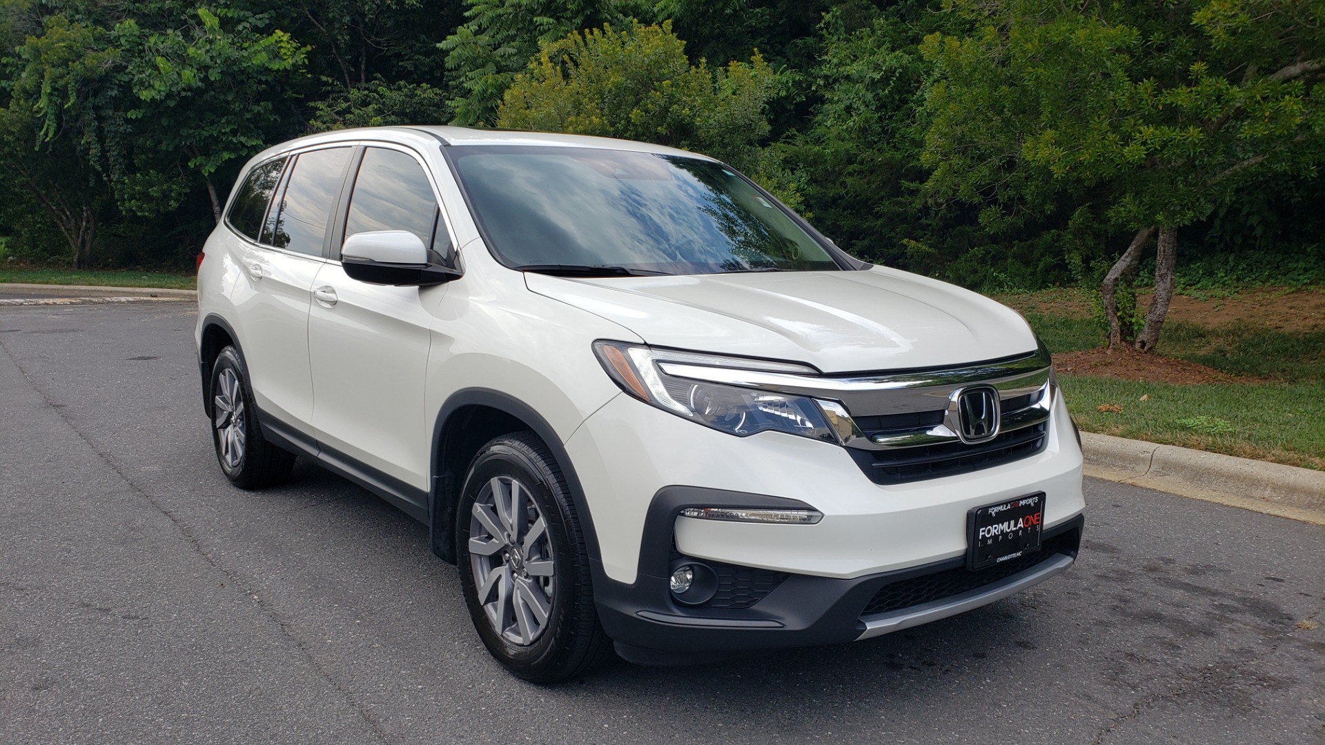 Used 2019 Honda PILOT EX-L / V6 / NAV / SUNROOF / DVD / 3-ROW / REARVIEW for sale Sold at Formula Imports in Charlotte NC 28227 4