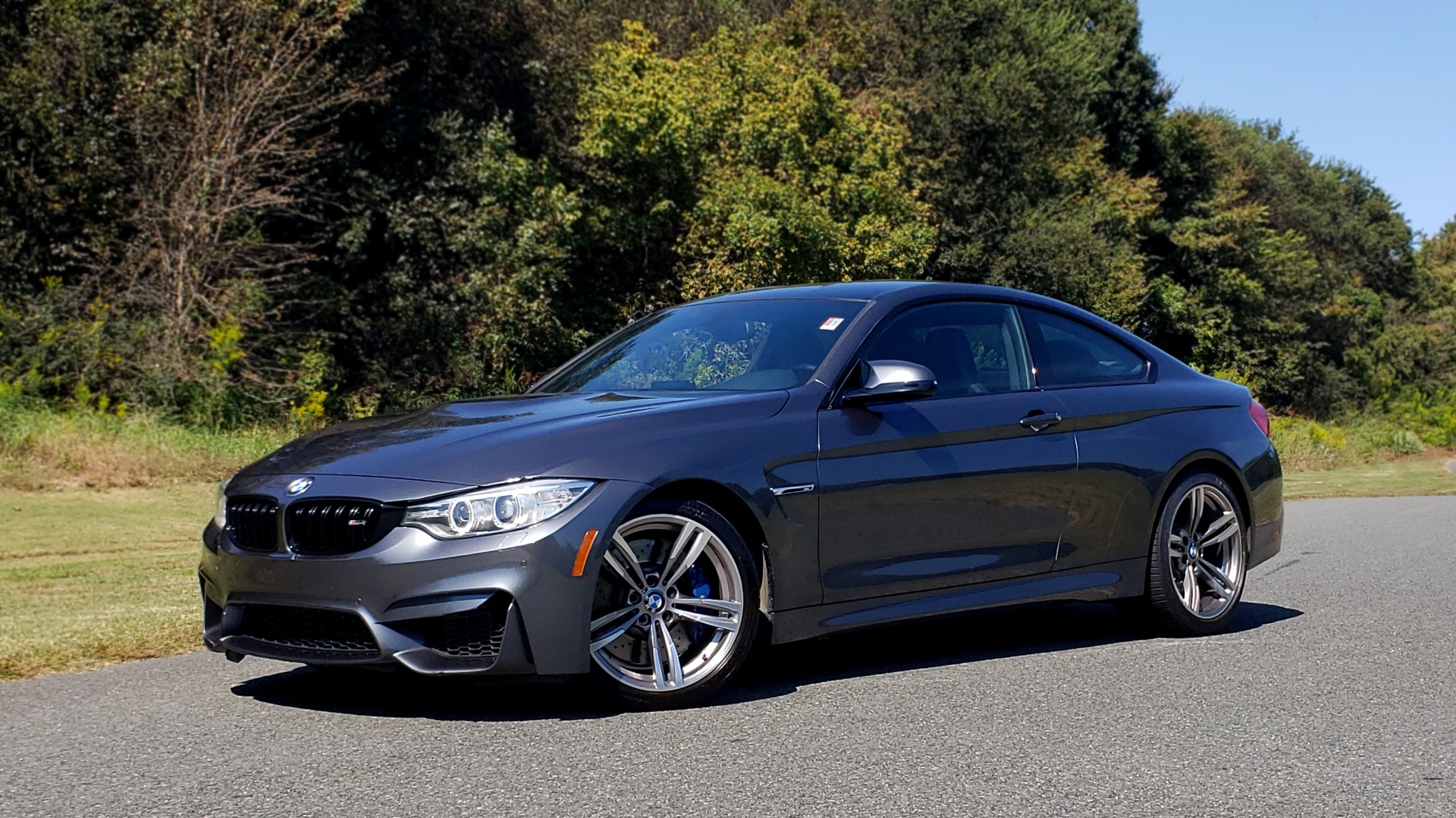 Used 2015 BMW M4 COUPE / EXEC PKG / ADAPT M SUSP / CF ROOF / NAV / REARVIEW for sale Sold at Formula Imports in Charlotte NC 28227 1