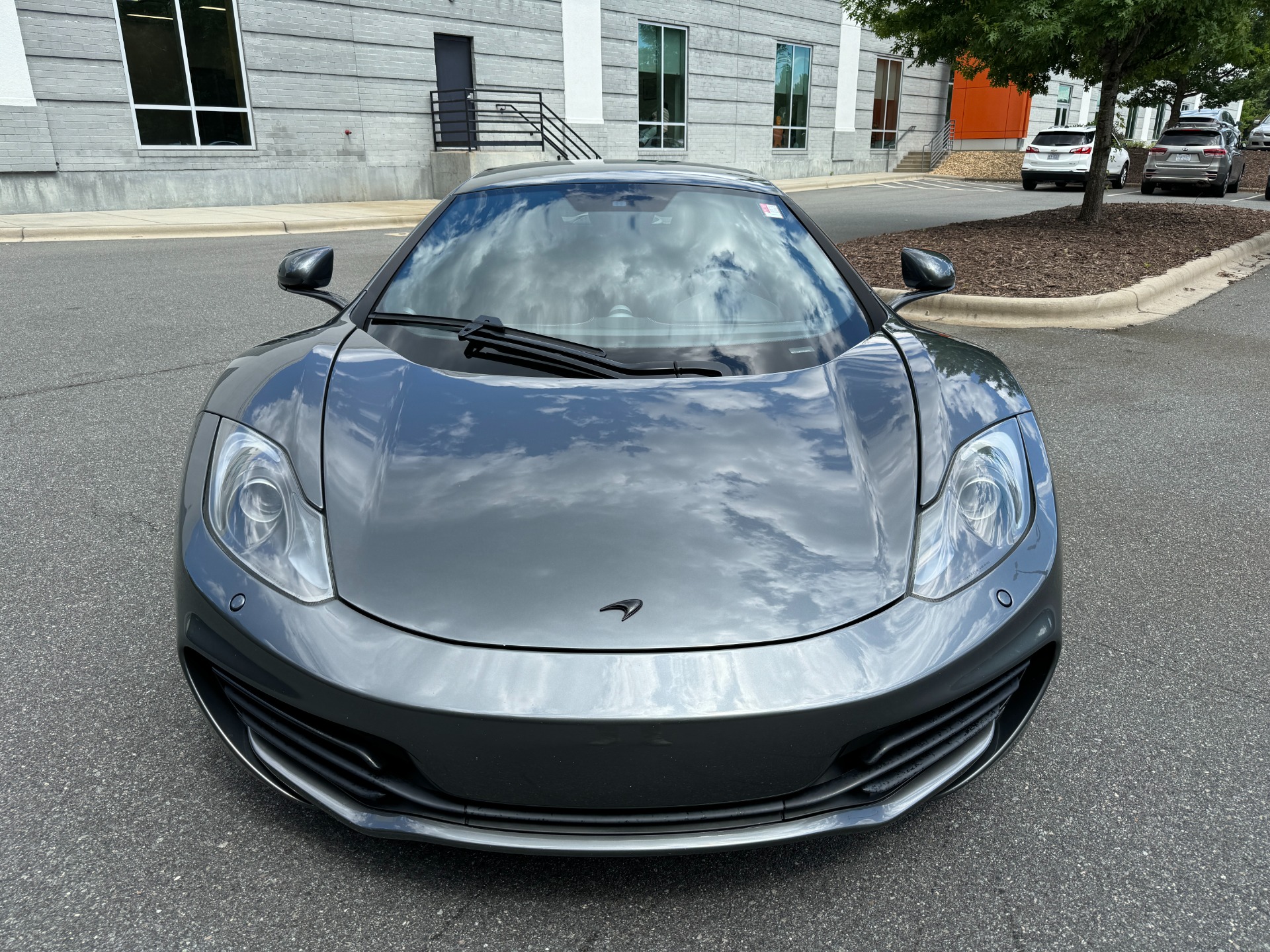 Used 2012 McLaren MP4-12C COUPE / 3.8 L V8 592HP / AUTO / NAV / CCB / LOW MILES for sale Sold at Formula Imports in Charlotte NC 28227 2