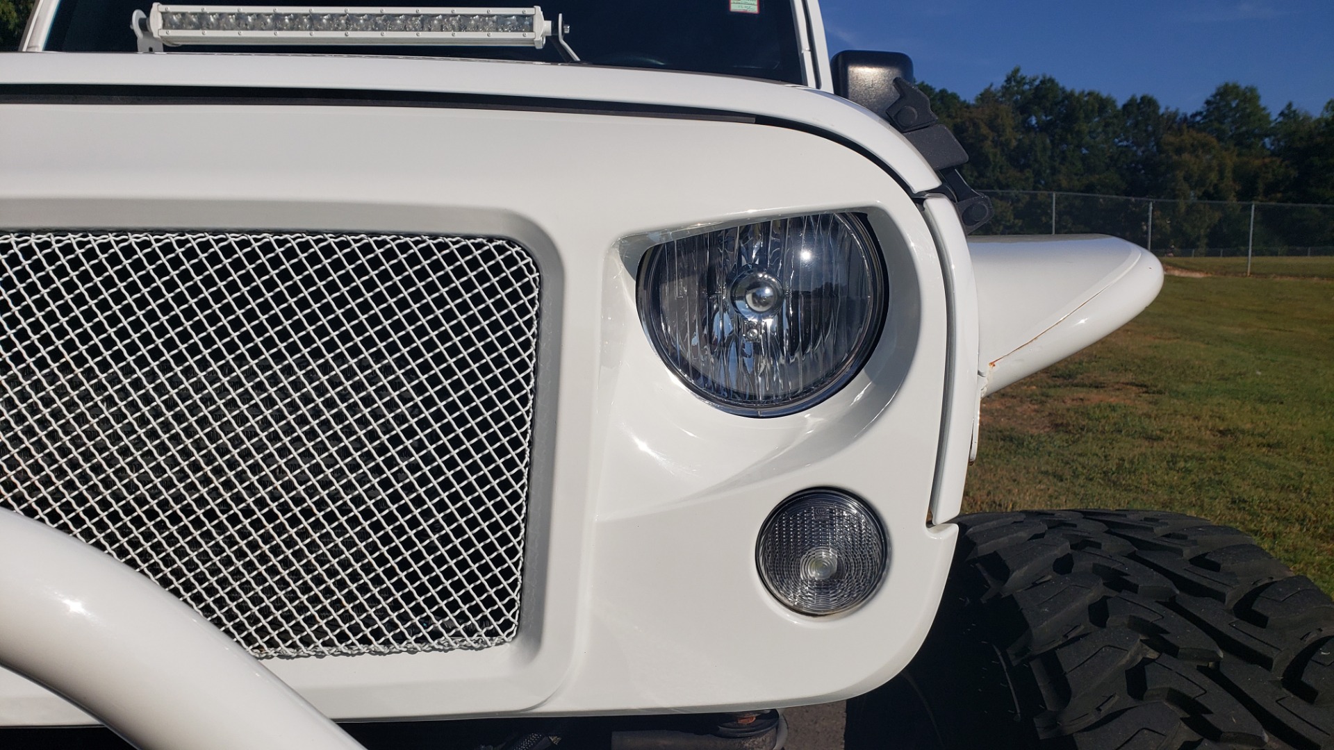 Used 2016 Jeep WRANGLER UNLIMITED SAHARA 4X4 / 3.6L V6 / CUSTOM LIFT / 24-IN WHEELS / 40-IN TIRES for sale Sold at Formula Imports in Charlotte NC 28227 16