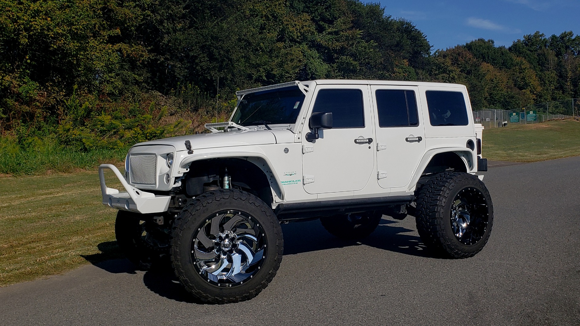 Used 2016 Jeep WRANGLER UNLIMITED SAHARA 4X4 / 3.6L V6 / CUSTOM LIFT / 24-IN WHEELS / 40-IN TIRES for sale Sold at Formula Imports in Charlotte NC 28227 3
