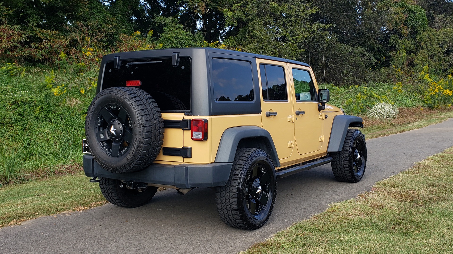 Used 2013 Jeep WRANGLER UNLIMITED SPORT 4X4 / 3.6L V6 / 5-SPD AUTO / 3-PC FREEDOM TOP for sale Sold at Formula Imports in Charlotte NC 28227 2
