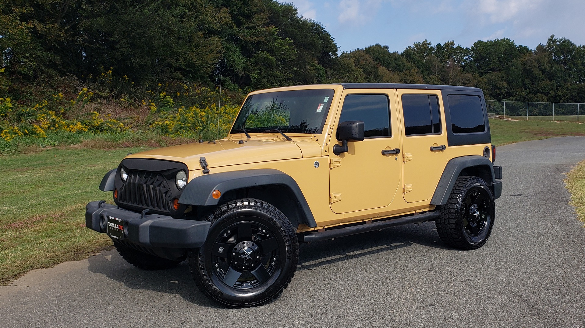 Used 2013 Jeep WRANGLER UNLIMITED SPORT 4X4 / 3.6L V6 / 5-SPD AUTO / 3-PC FREEDOM TOP for sale Sold at Formula Imports in Charlotte NC 28227 3