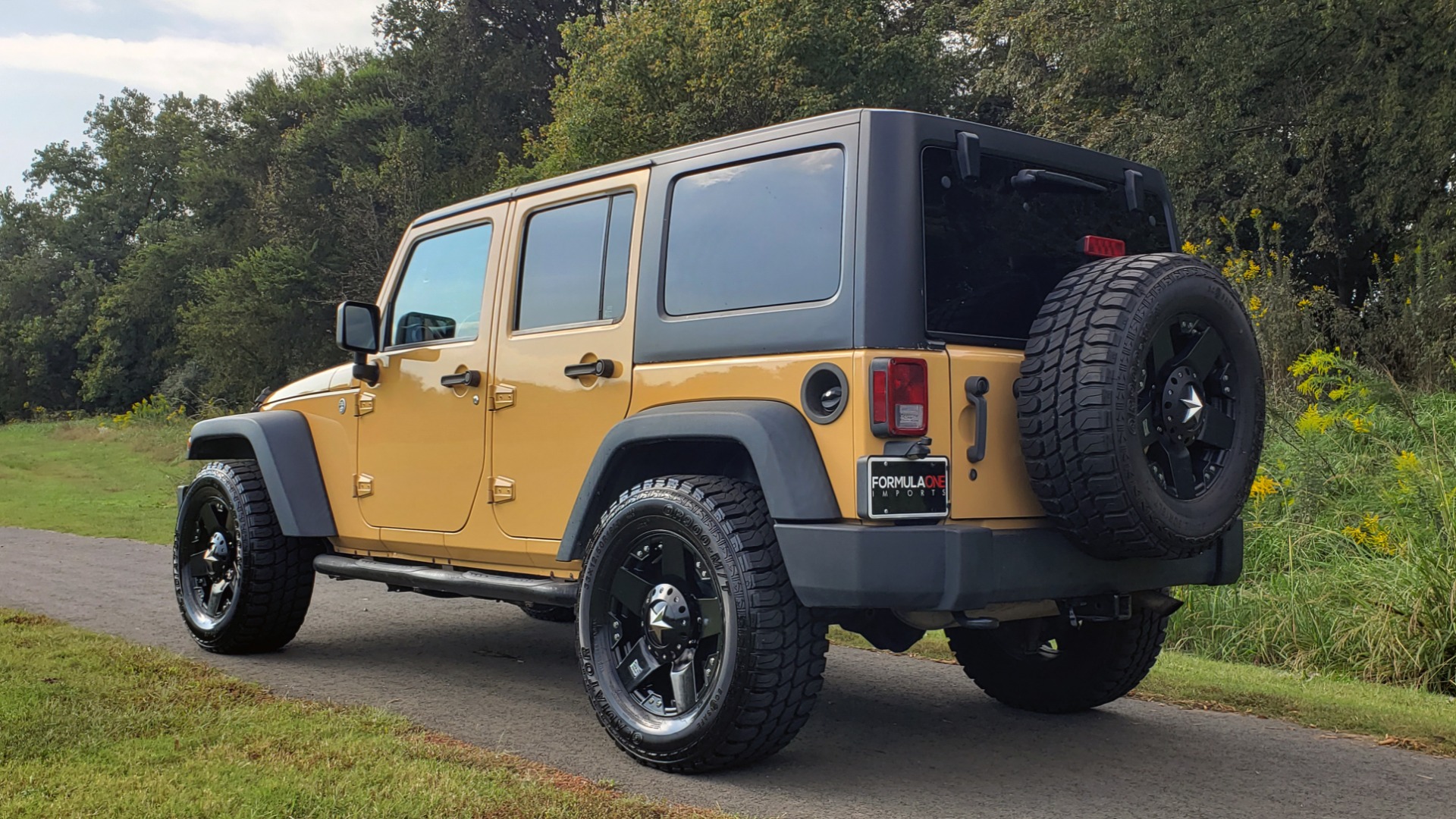 Used 2013 Jeep WRANGLER UNLIMITED SPORT 4X4 / 3.6L V6 / 5-SPD AUTO / 3-PC FREEDOM TOP for sale Sold at Formula Imports in Charlotte NC 28227 6