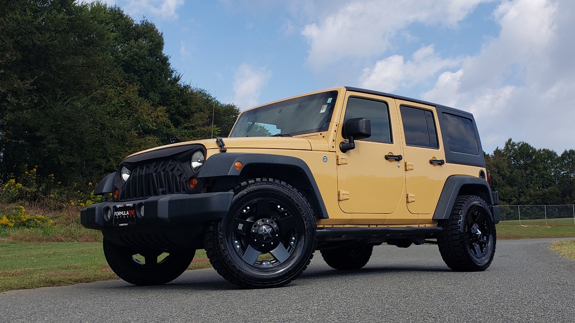 Used 2013 Jeep WRANGLER UNLIMITED SPORT 4X4 / 3.6L V6 / 5-SPD AUTO / 3-PC FREEDOM TOP for sale Sold at Formula Imports in Charlotte NC 28227 1